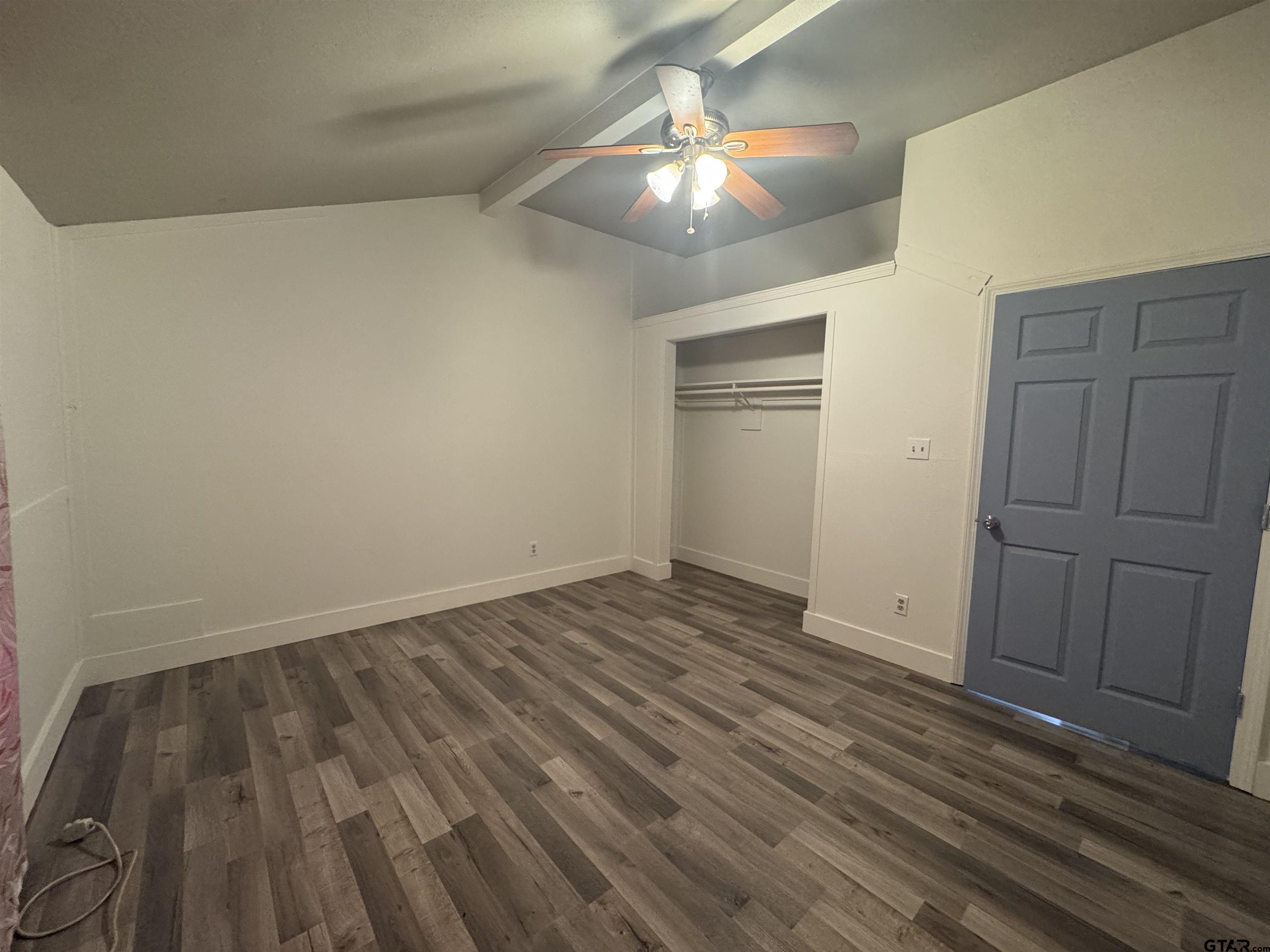 8124 County Road 381 Tyler, TX 75708 - Photo 13 of 23 wooden floor in an empty room