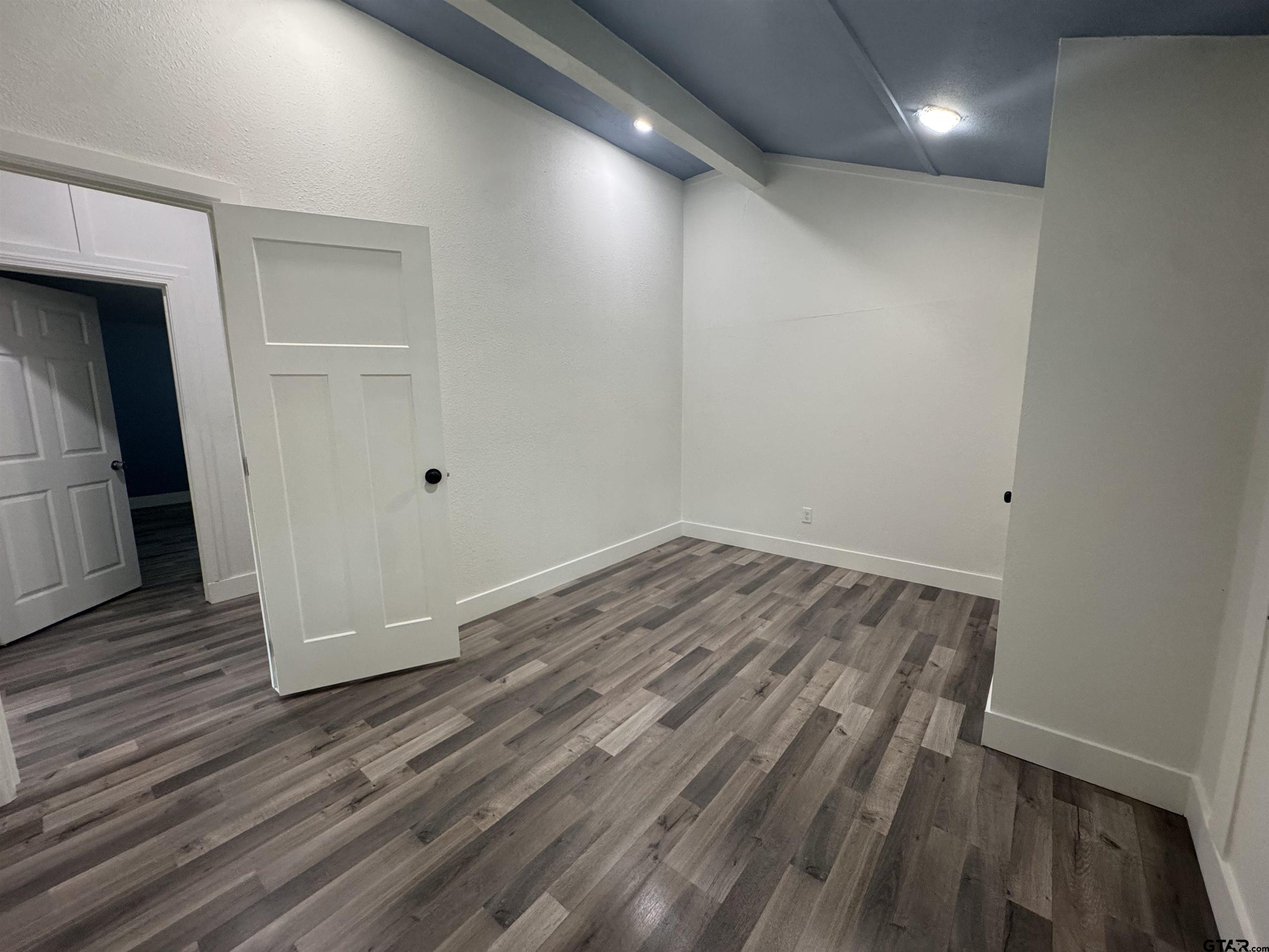 8124 County Road 381 Tyler, TX 75708 - Photo 14 of 23 a view of room with wooden floor