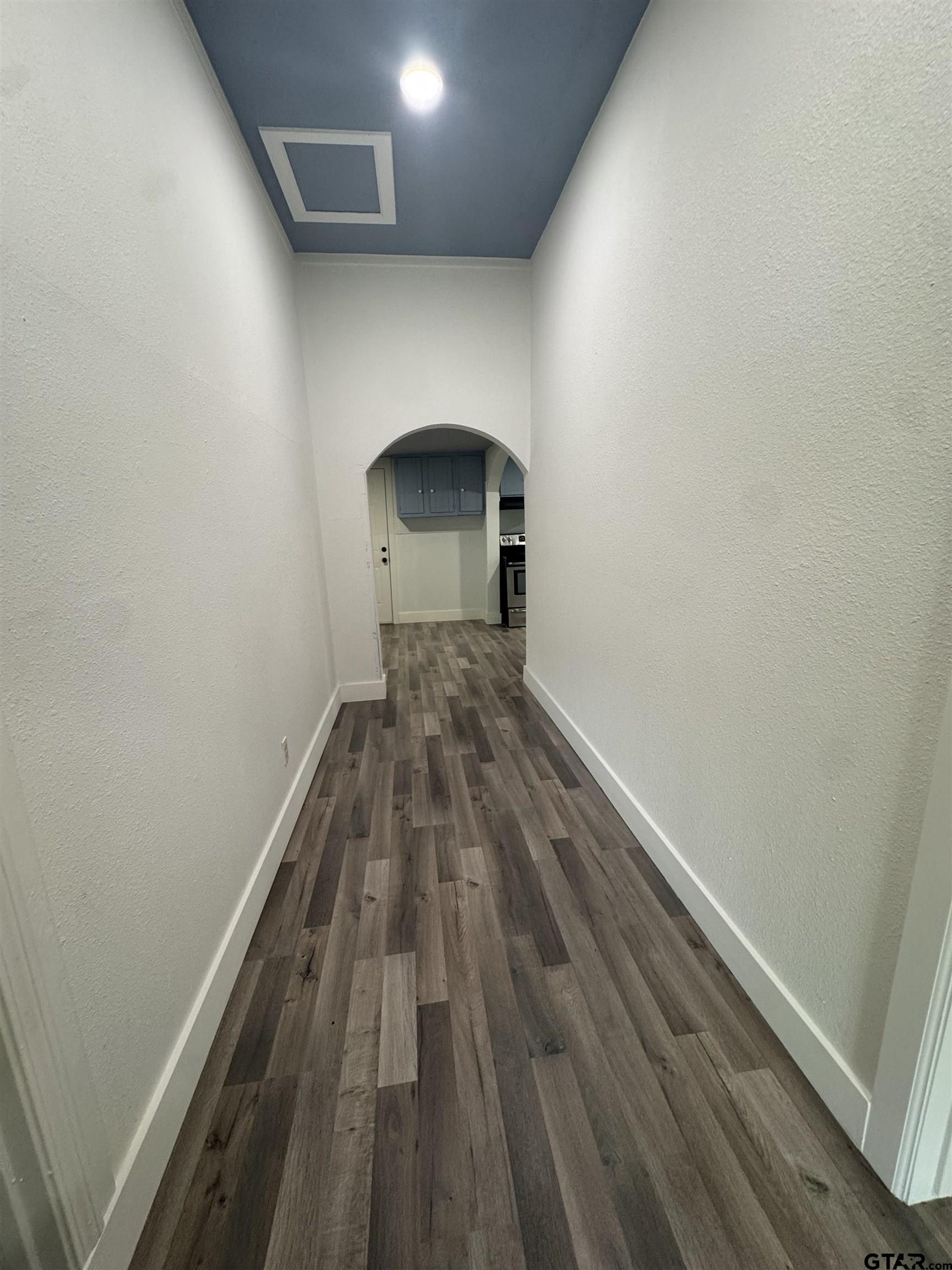 8124 County Road 381 Tyler, TX 75708 - Photo 17 of 23 a view of a small space with wooden floor