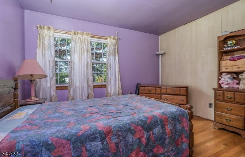 1868 Amwell Road Somerset, NJ 08873 - Photo 14 of 23 a bedroom with a bed and a window