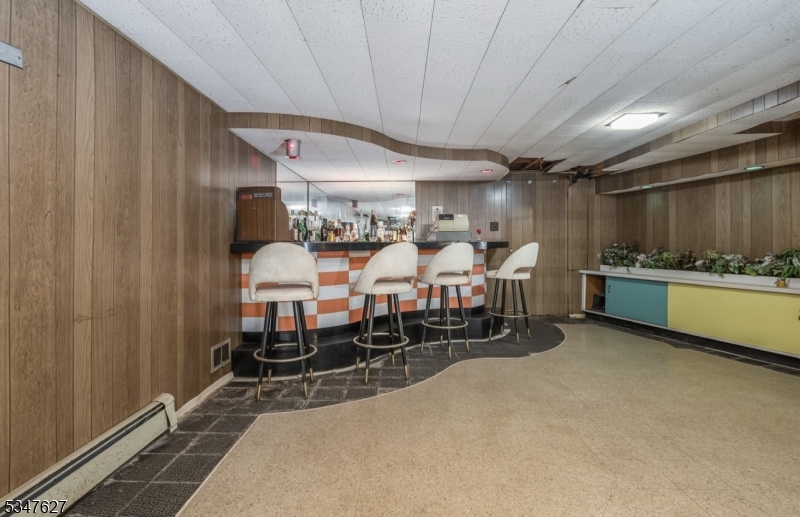 1868 Amwell Road Somerset, NJ 08873 - Photo 17 of 23 a large room with chairs