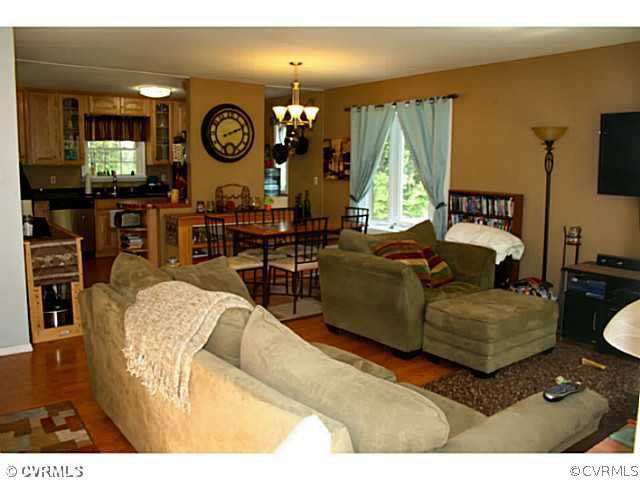 9112 East Patrick Henry Road Ashland, VA 23005 - Photo 2 of 11 Den/Family/Great Room - Laminate floor, open to ea