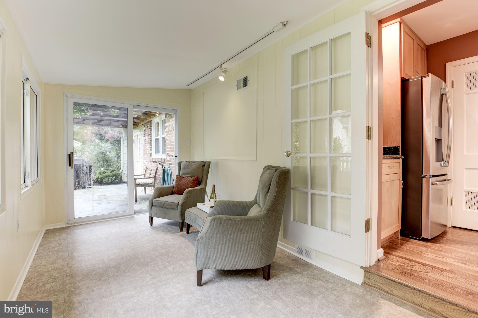 8006 New Market Road Alexandria, VA 22308 - Photo 15 of 37 Sun Room/Family Room-French Door, New Floor/Paint.