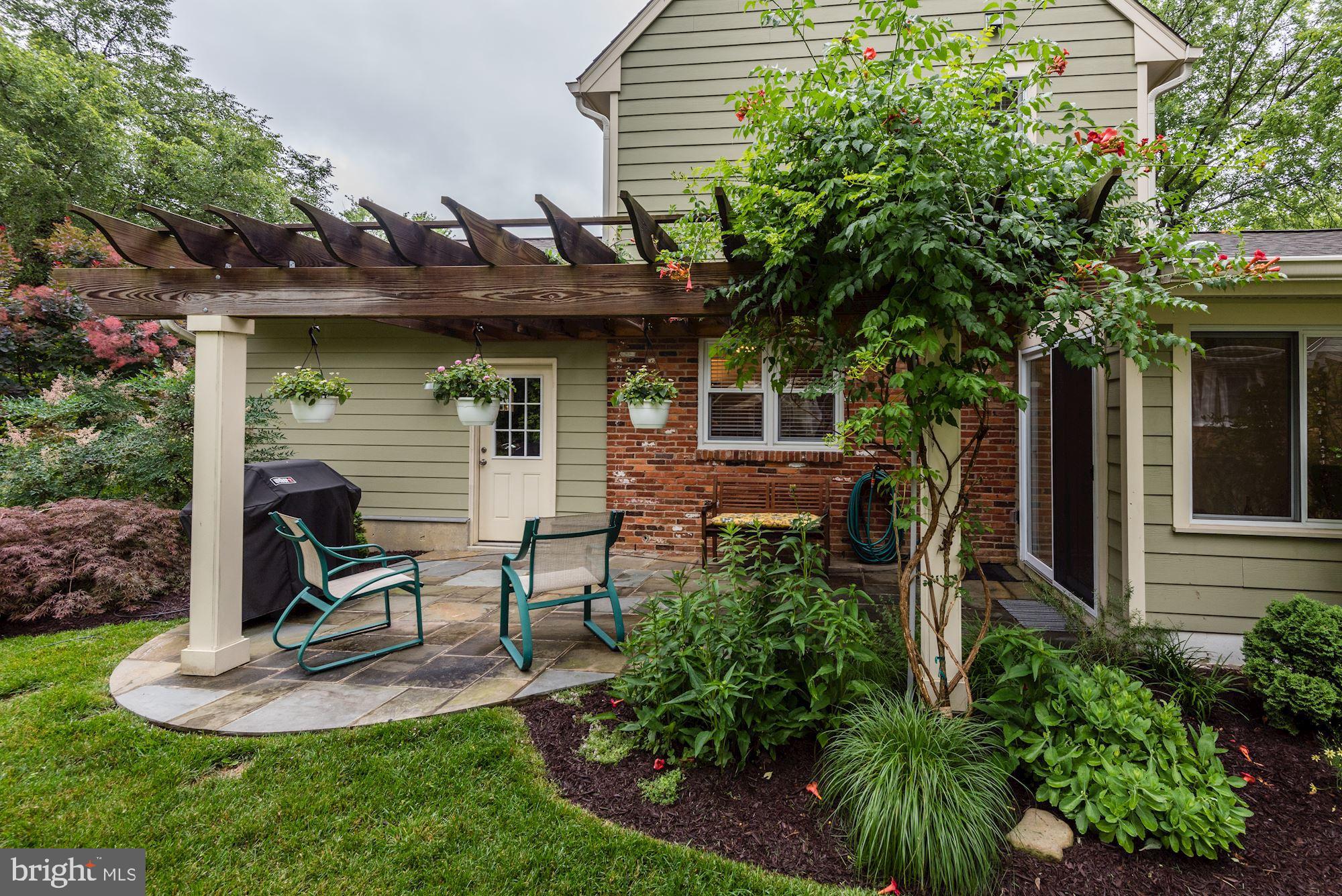 8006 New Market Road Alexandria, VA 22308 - Photo 17 of 37 Well Landscaped Back Yard