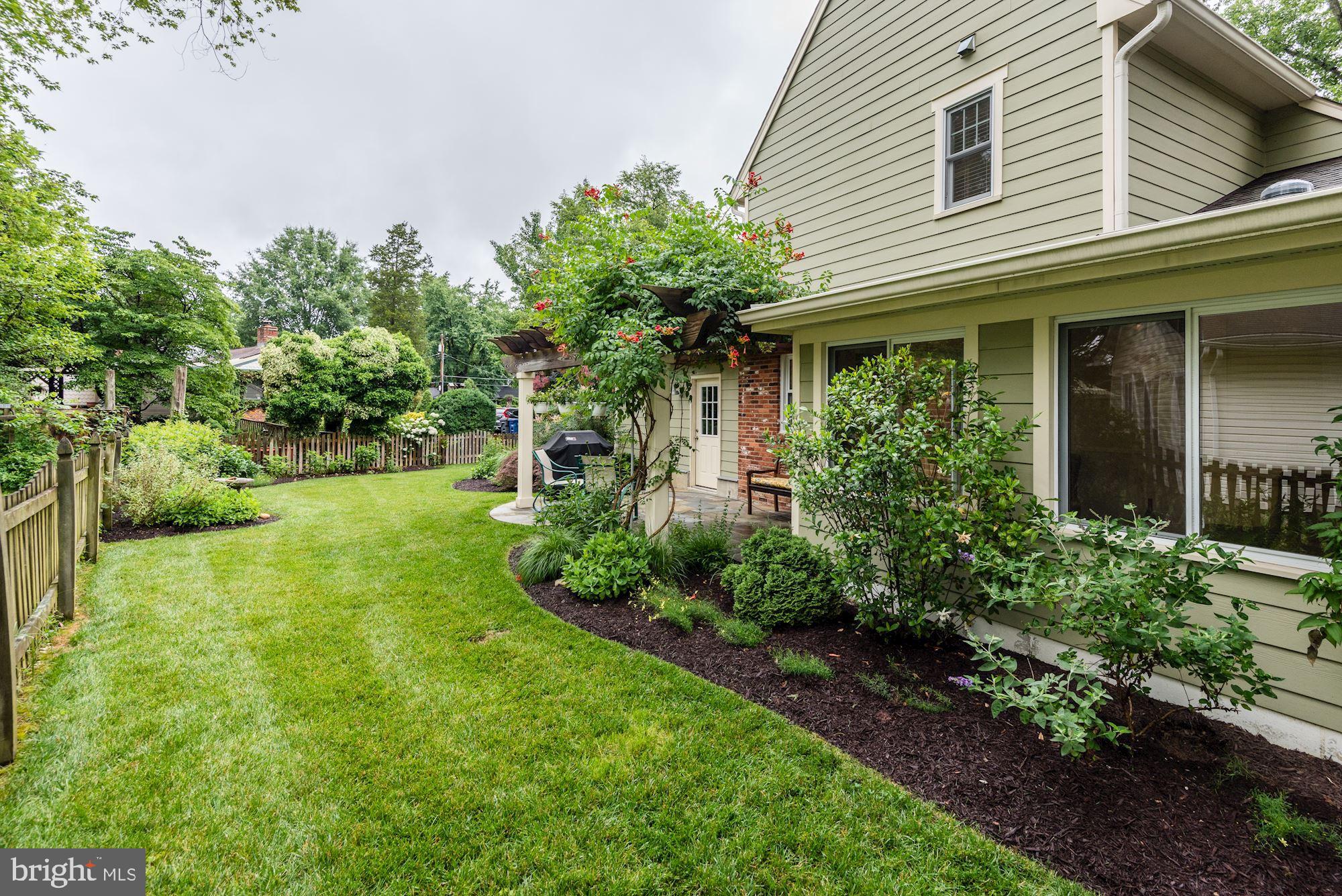 8006 New Market Road Alexandria, VA 22308 - Photo 34 of 37 New Mulch. Well Maintained Lawn.
