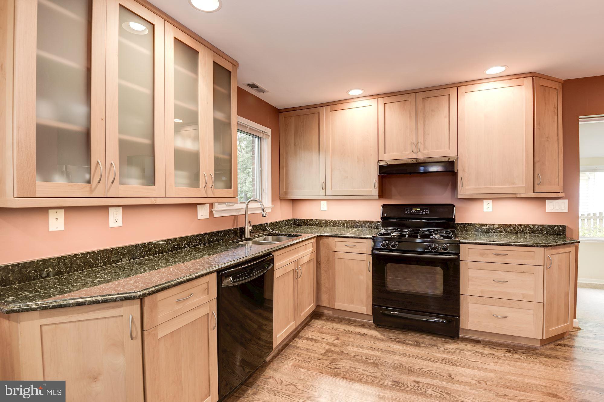 8006 New Market Road Alexandria, VA 22308 - Photo 10 of 37 Granite Counters, 42" Alder Wood Cabinets
