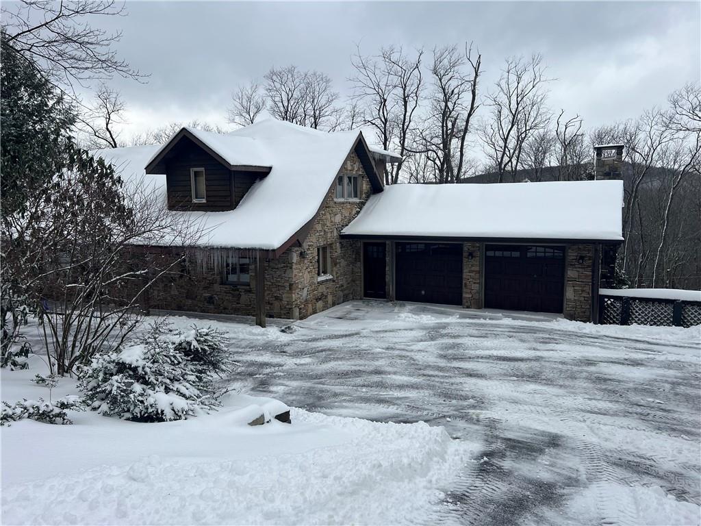 274 Alpine Heights Road Champion, PA 15622 - Photo 1 of 34 a view of a house with a snow in the yard