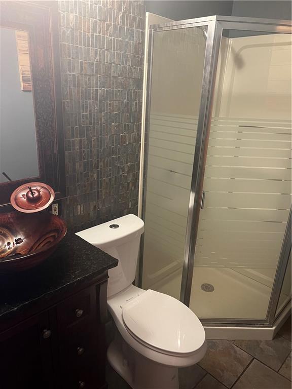 274 Alpine Heights Road Champion, PA 15622 - Photo 14 of 34 a white toilet sitting next to a shower