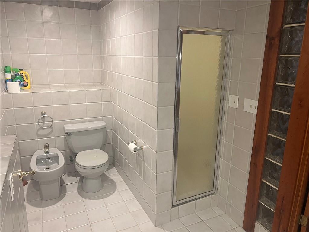 274 Alpine Heights Road Champion, PA 15622 - Photo 21 of 34 a bathroom with a toilet and a shower