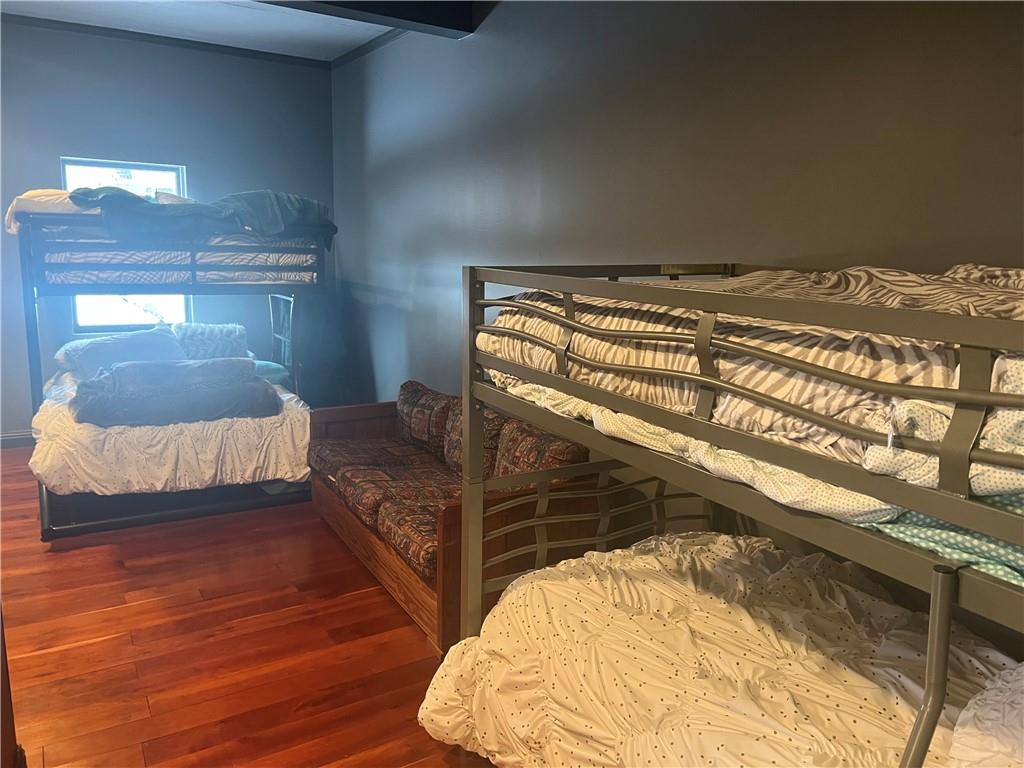 274 Alpine Heights Road Champion, PA 15622 - Photo 24 of 34 a bedroom with a bed and a lamp