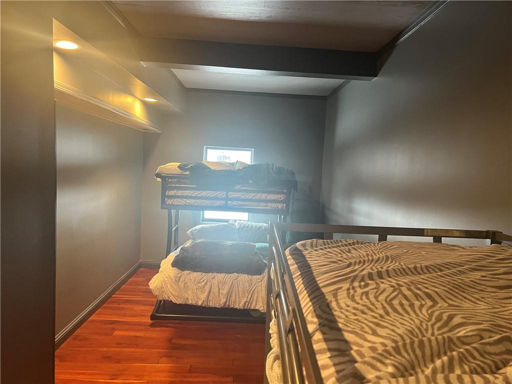 274 Alpine Heights Road Champion, PA 15622 - Photo 26 of 34 a bedroom with a bed and lamp