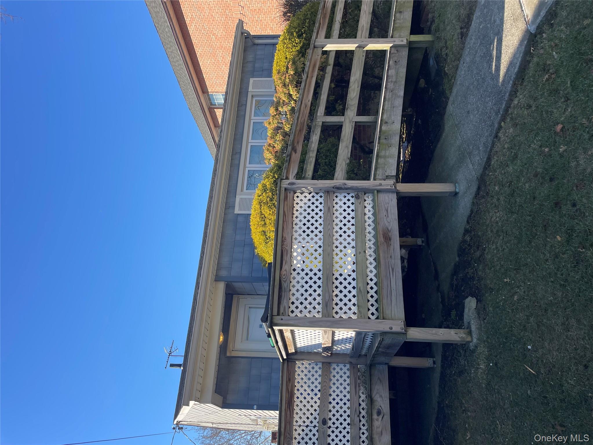 154-58 20th Road Queens, NY 11357 - Photo 1 of 27 a view of a backyard