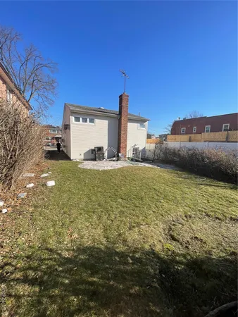 a view of a backyard of a house