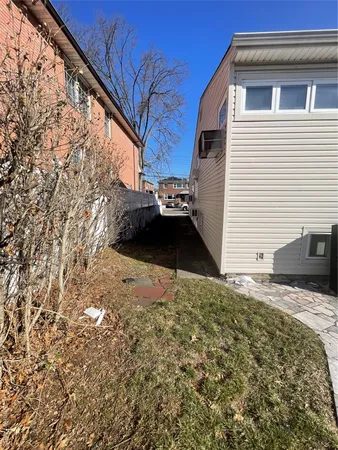 a view of a pathway with a house