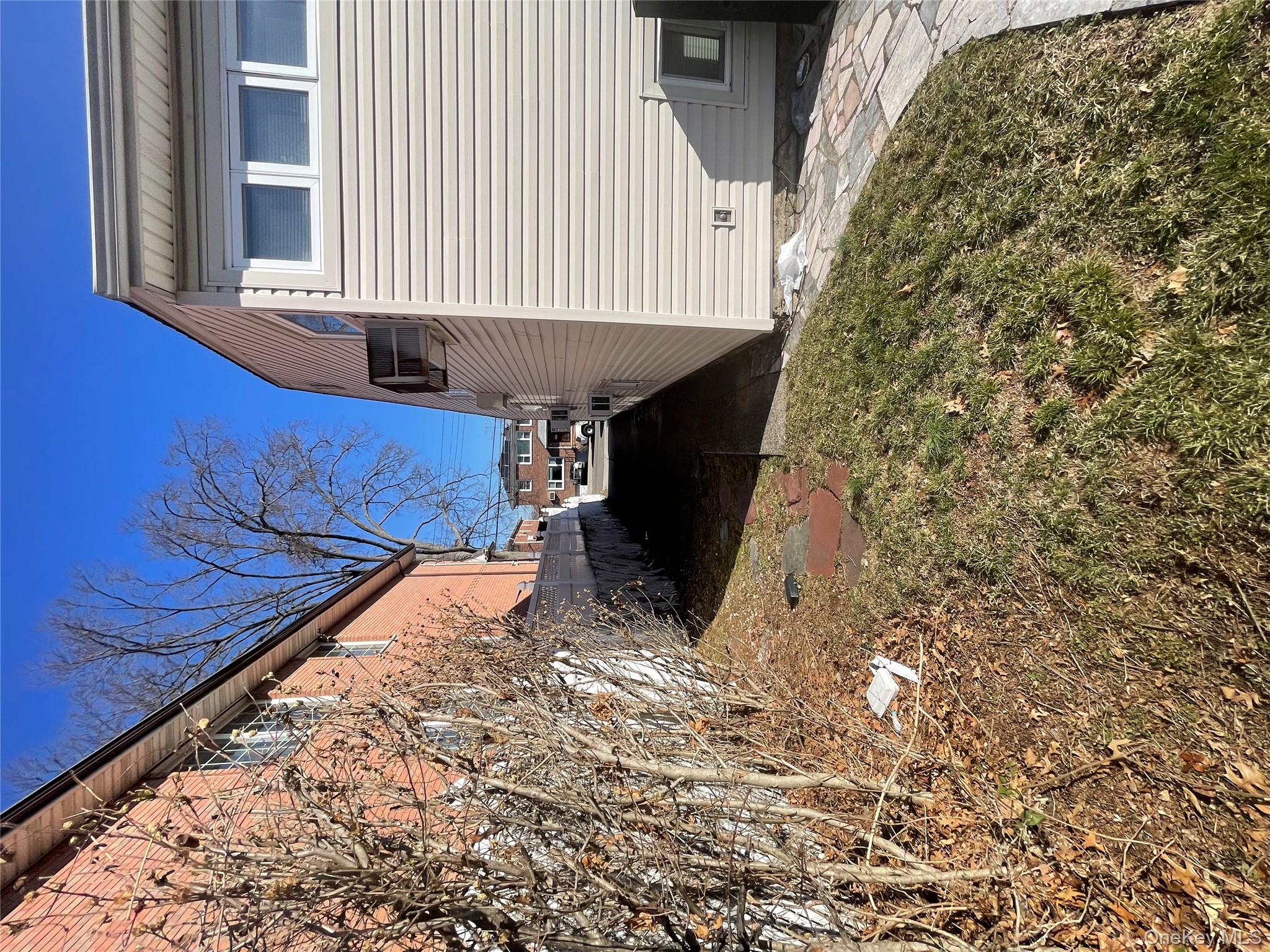 154-58 20th Road Queens, NY 11357 - Photo 25 of 27 a view of a backyard of a house