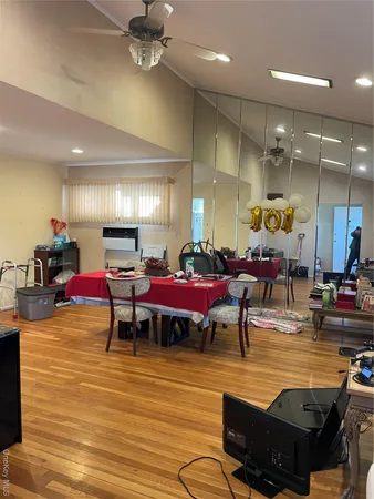 a room with lots of chairs and pool table