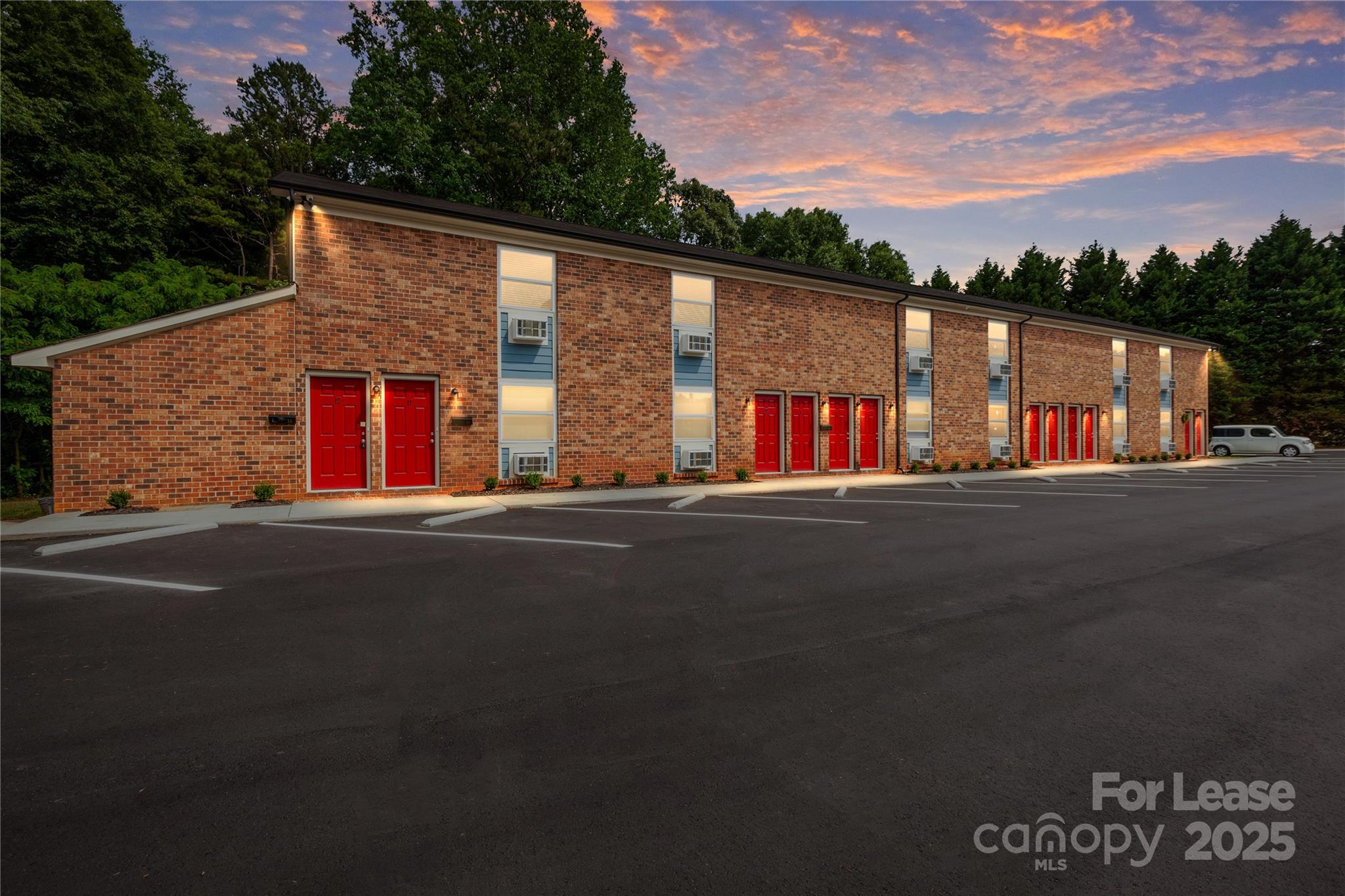 1850 Lowell Bethesda Road, Unit 2 Gastonia, NC 28056 - Photo 3 of 14 a view of street with large building