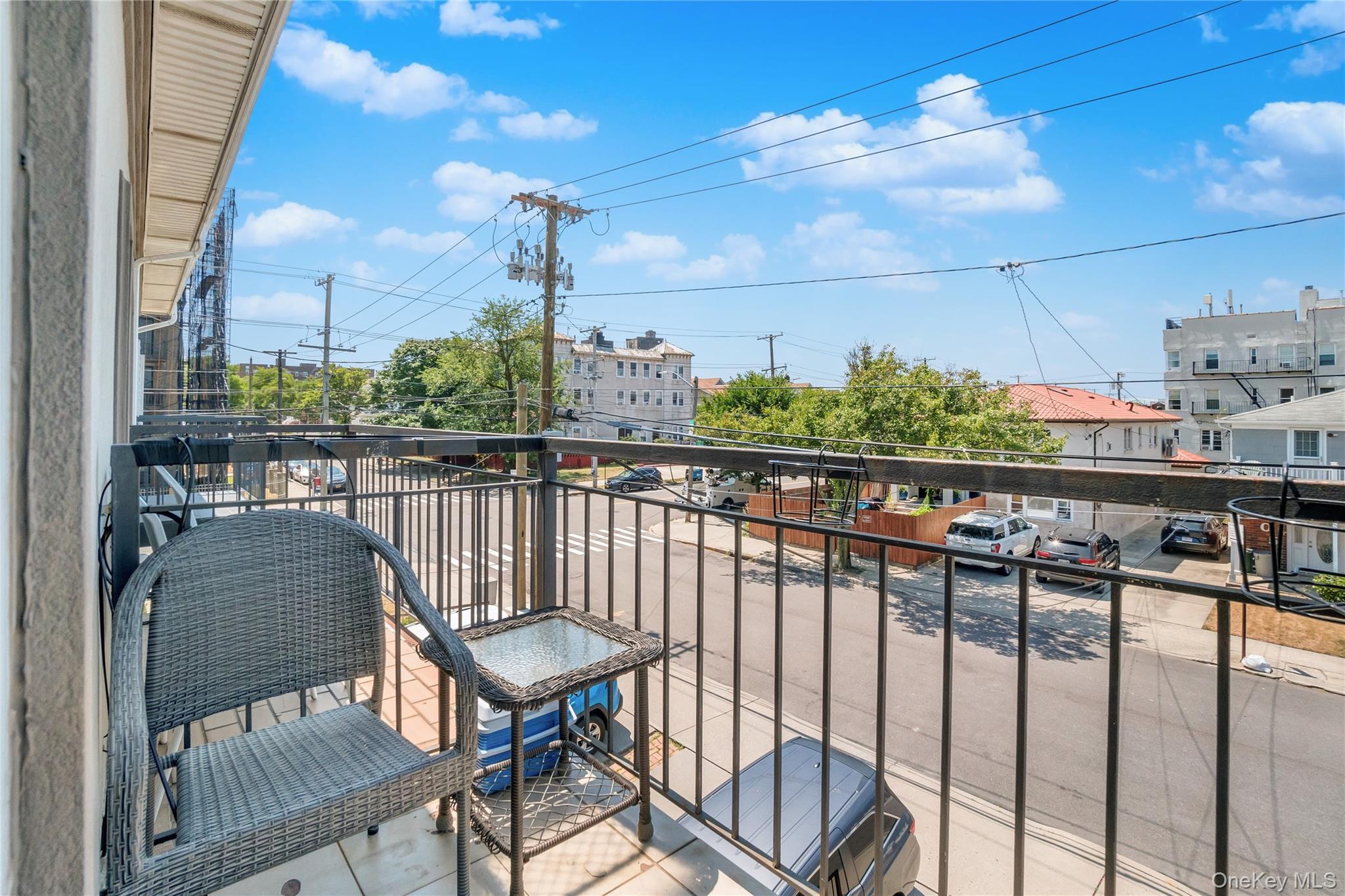 208 Beach 124th Street, Unit 6 Queens, NY 11694 - Photo 16 of 16 a view of a balcony with chairs