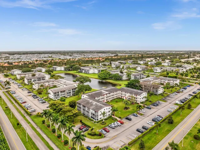 an aerial view of a houses with outdoor space