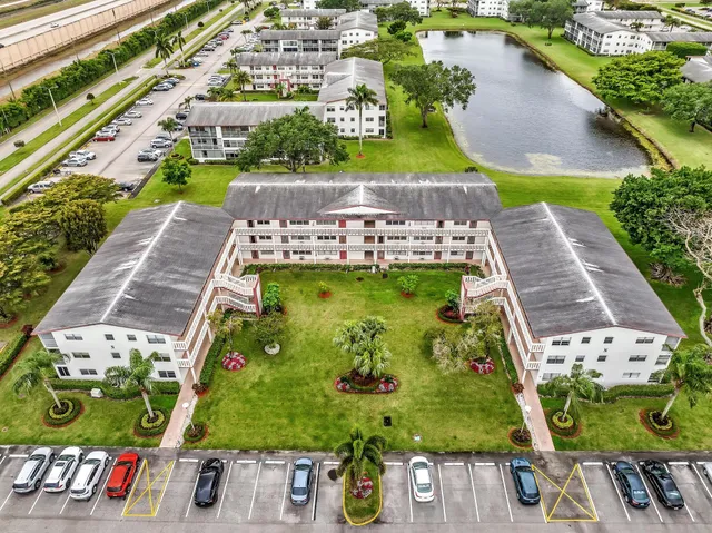 an aerial view of a house with a garden