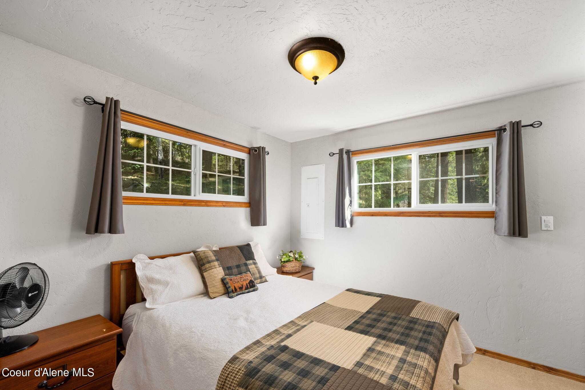 19503 East Hayden Lake Road Hayden, ID 83835 - Photo 31 of 57 main floor bedroom