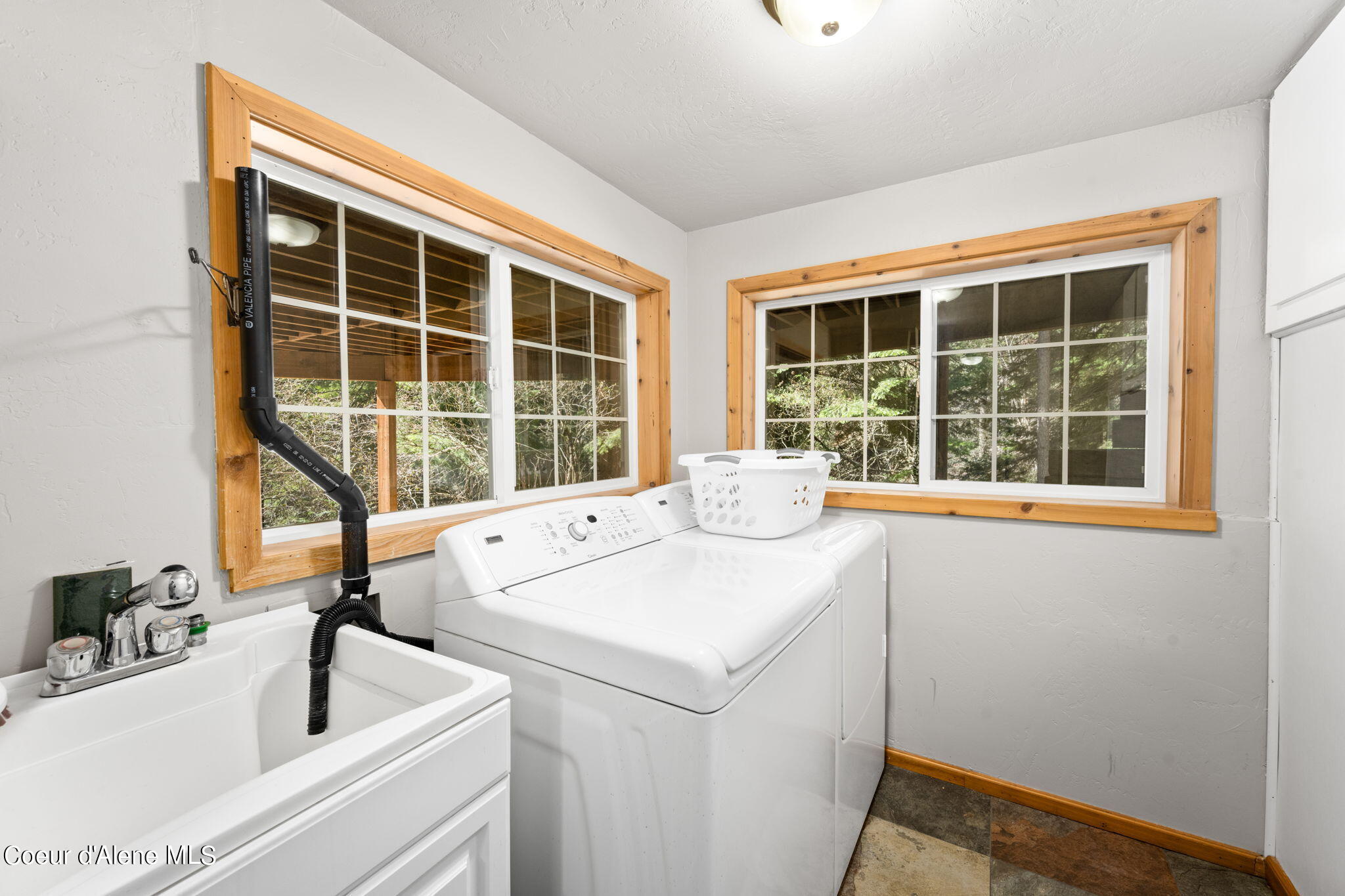 19503 East Hayden Lake Road Hayden, ID 83835 - Photo 46 of 57 basement laundry