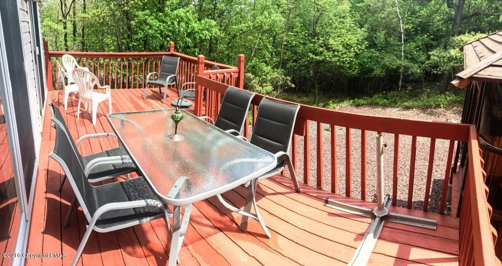 154 Upper Notch Road Albrightsville, PA 18210 - Photo 5 of 25 a view of balcony with wooden floor and outdoor seating
