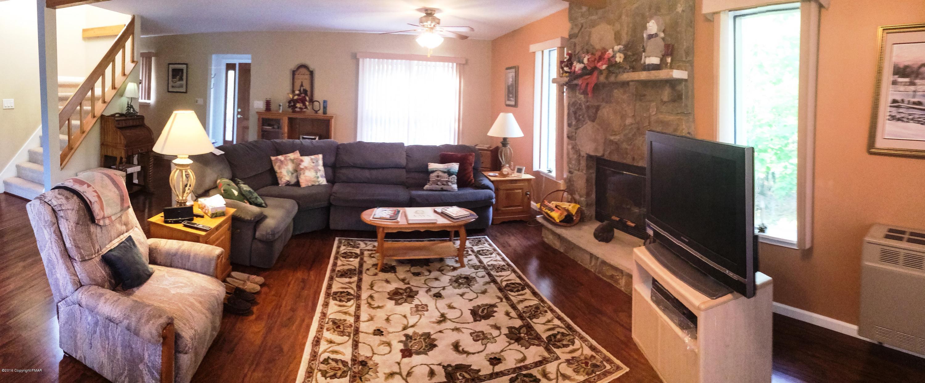 154 Upper Notch Road Albrightsville, PA 18210 - Photo 8 of 25 a living room with furniture and a flat screen tv