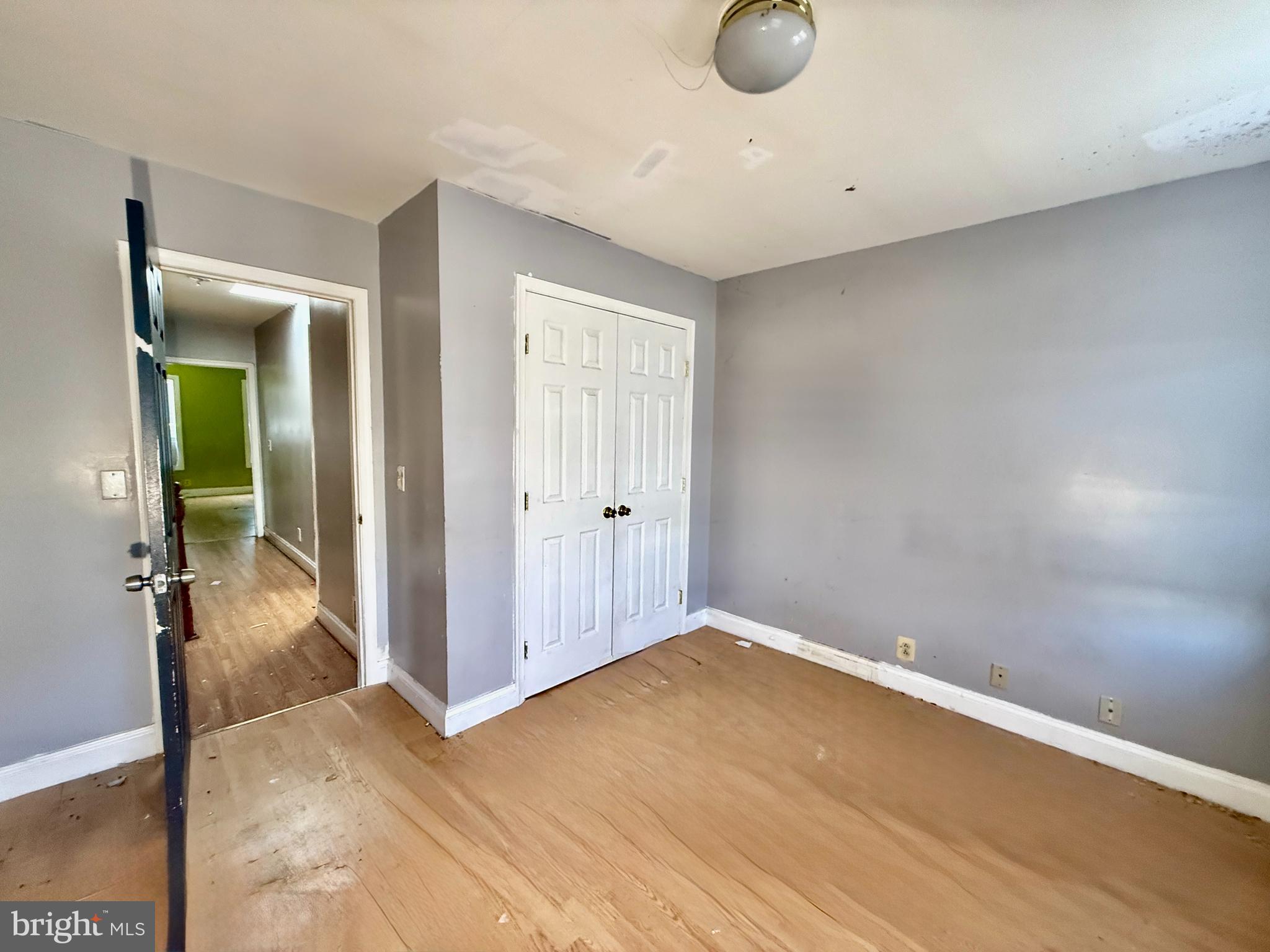 321 South Newkirk Street Baltimore, MD 21224 - Photo 7 of 8 a view of livingroom with wooden floor