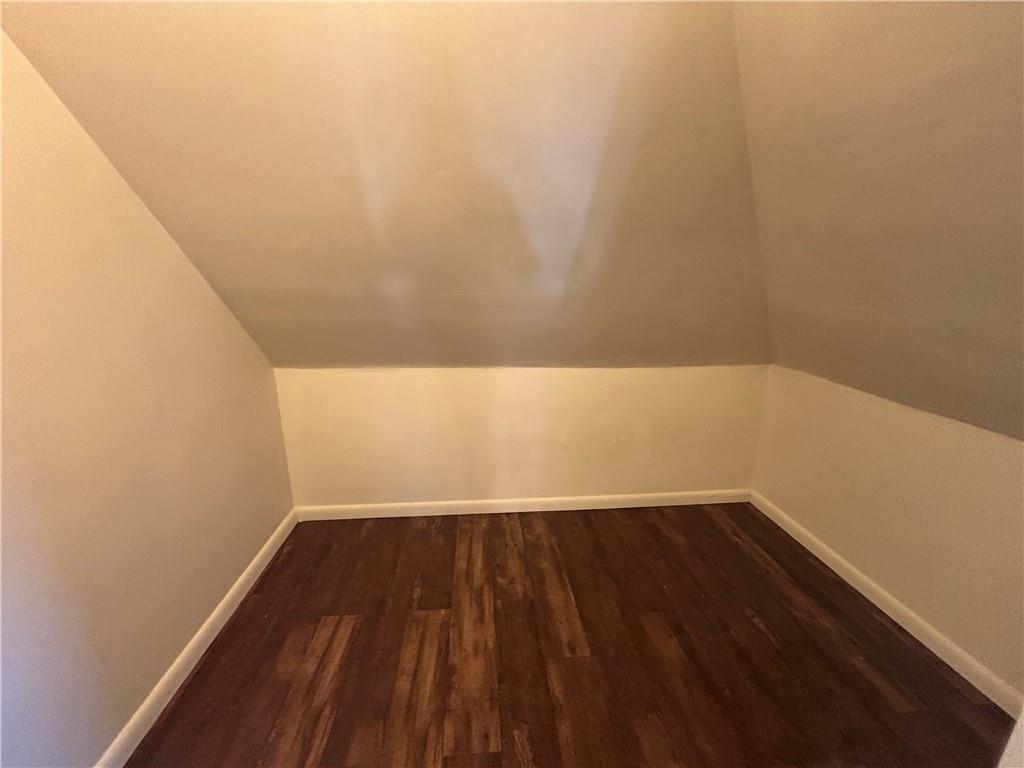 364 Ohio Avenue, Unit 2 Rochester, PA 15074 - Photo 16 of 16 a view of a small space with wooden floor and a window