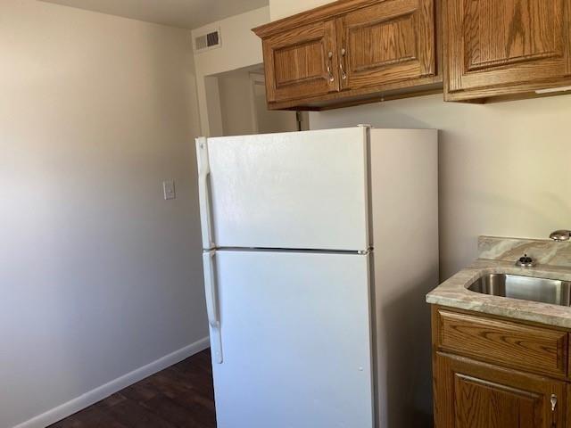 364 Ohio Avenue, Unit 2 Rochester, PA 15074 - Photo 4 of 16 a white refrigerator freezer sitting in a kitchen