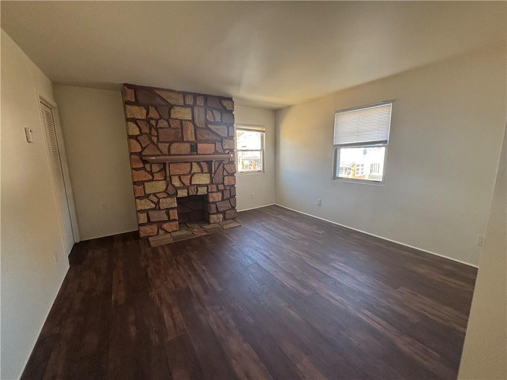 364 Ohio Avenue, Unit 2 Rochester, PA 15074 - Photo 5 of 16 wooden floor in an empty room with a window