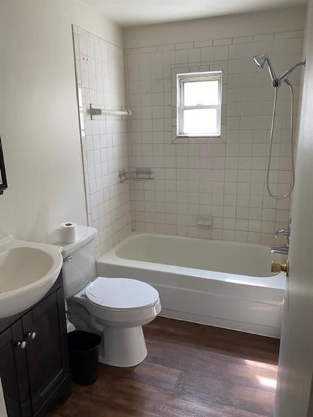 364 Ohio Avenue, Unit 2 Rochester, PA 15074 - Photo 7 of 16 a bathroom with a sink a toilet and a bathtub
