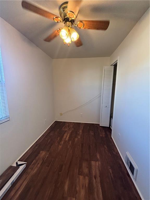 364 Ohio Avenue, Unit 2 Rochester, PA 15074 - Photo 8 of 16 an empty room with wooden floor and fan