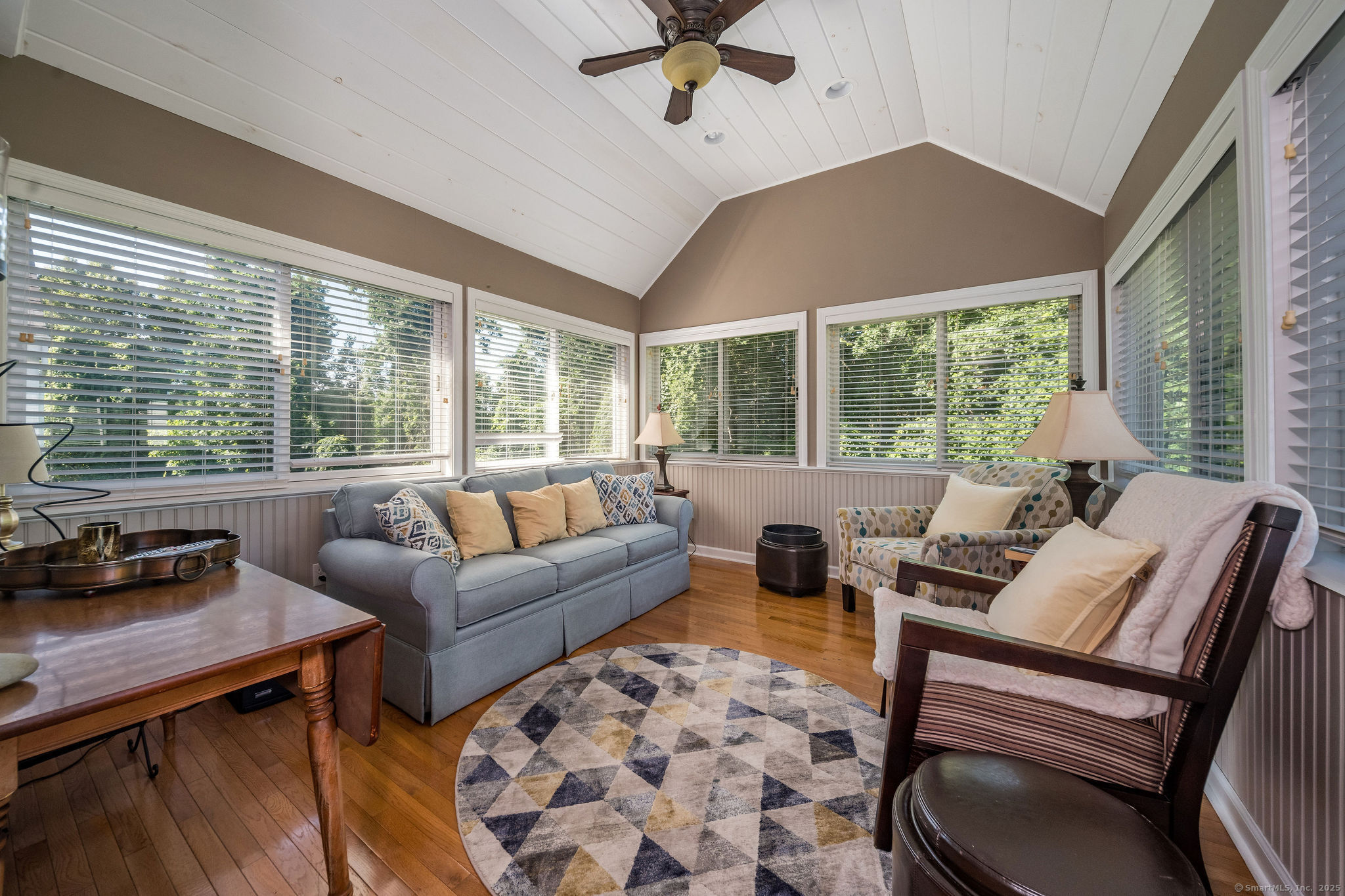 40 Legend Hill Road, Unit 40 Madison, CT 06443 - Photo 13 of 29 a living room with furniture and a large window