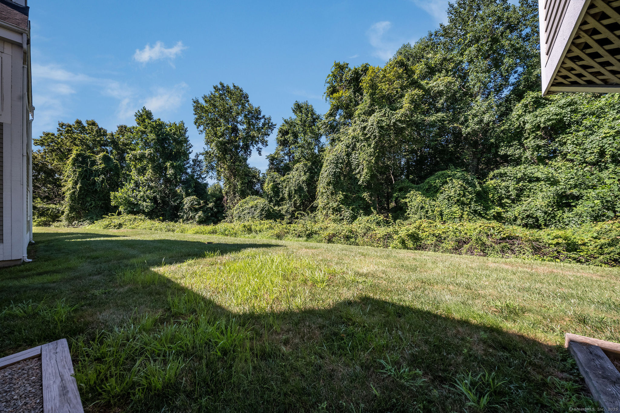 40 Legend Hill Road, Unit 40 Madison, CT 06443 - Photo 25 of 29 a view of yard with green space