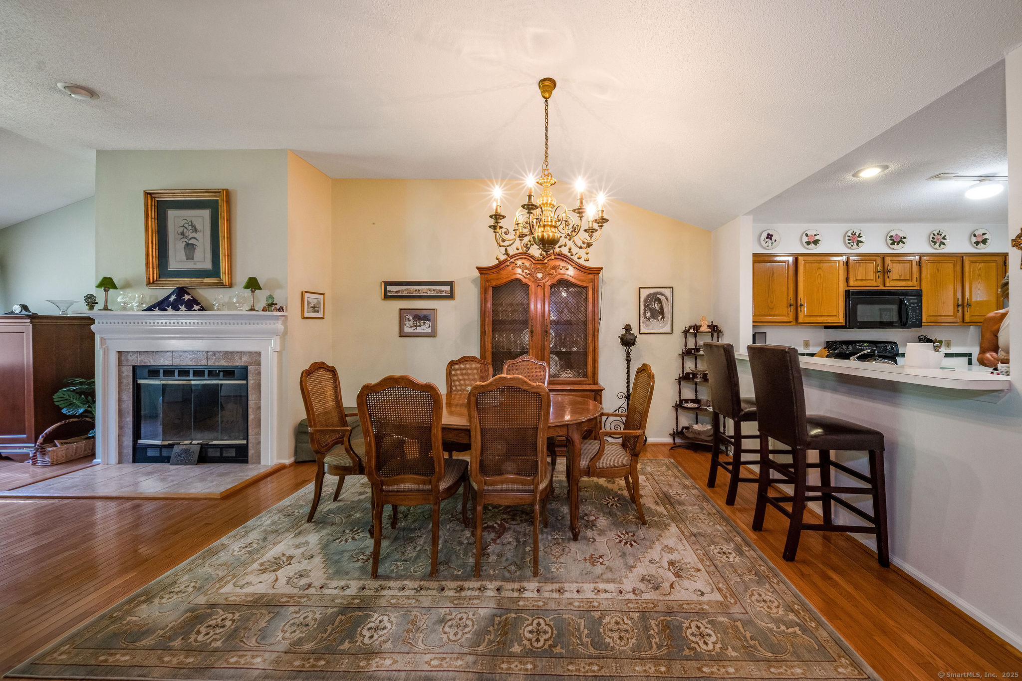 40 Legend Hill Road, Unit 40 Madison, CT 06443 - Photo 9 of 29 a view of a dining room with furniture window and wooden floor
