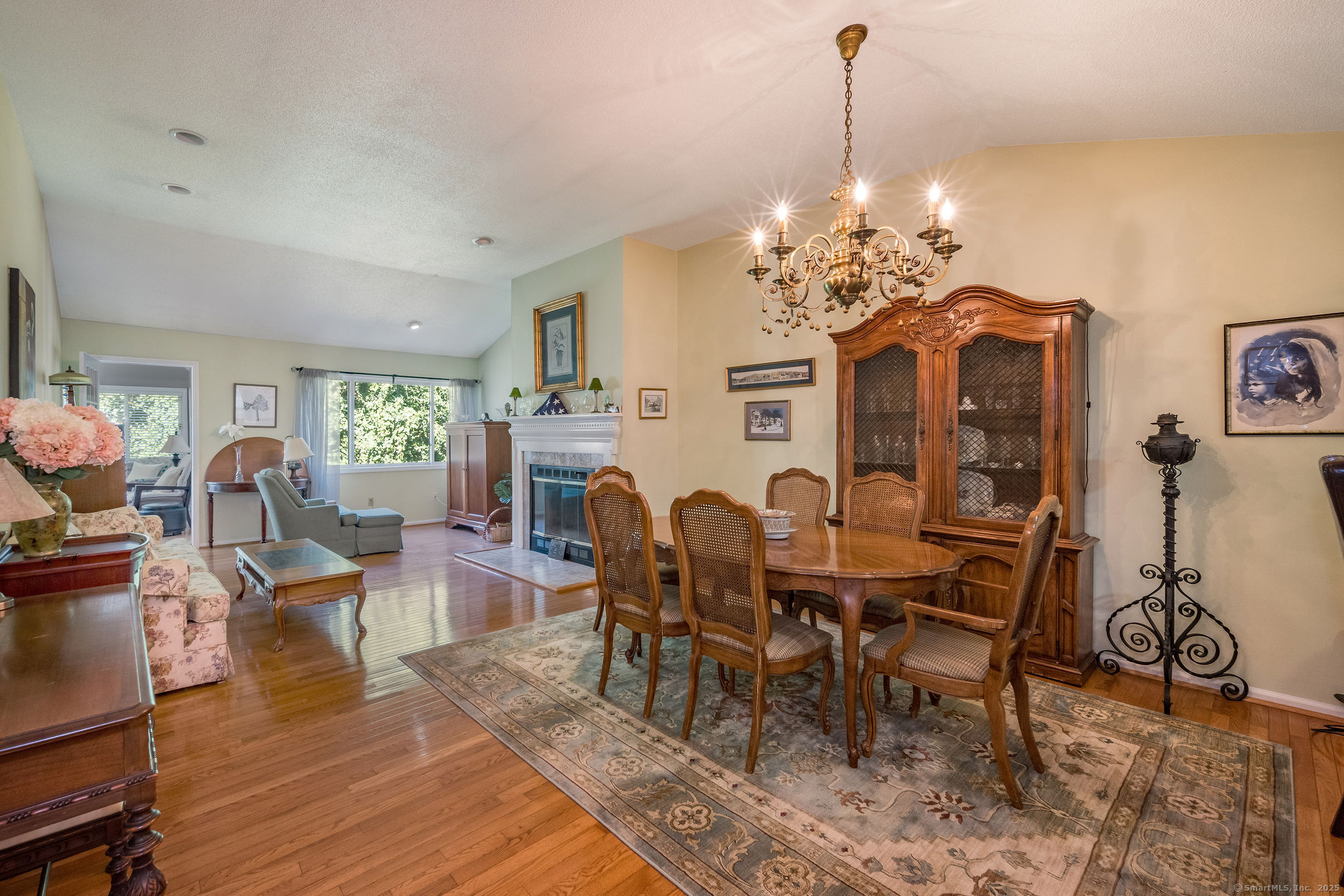 40 Legend Hill Road, Unit 40 Madison, CT 06443 - Photo 10 of 29 a view of a dining room with furniture window and wooden floor