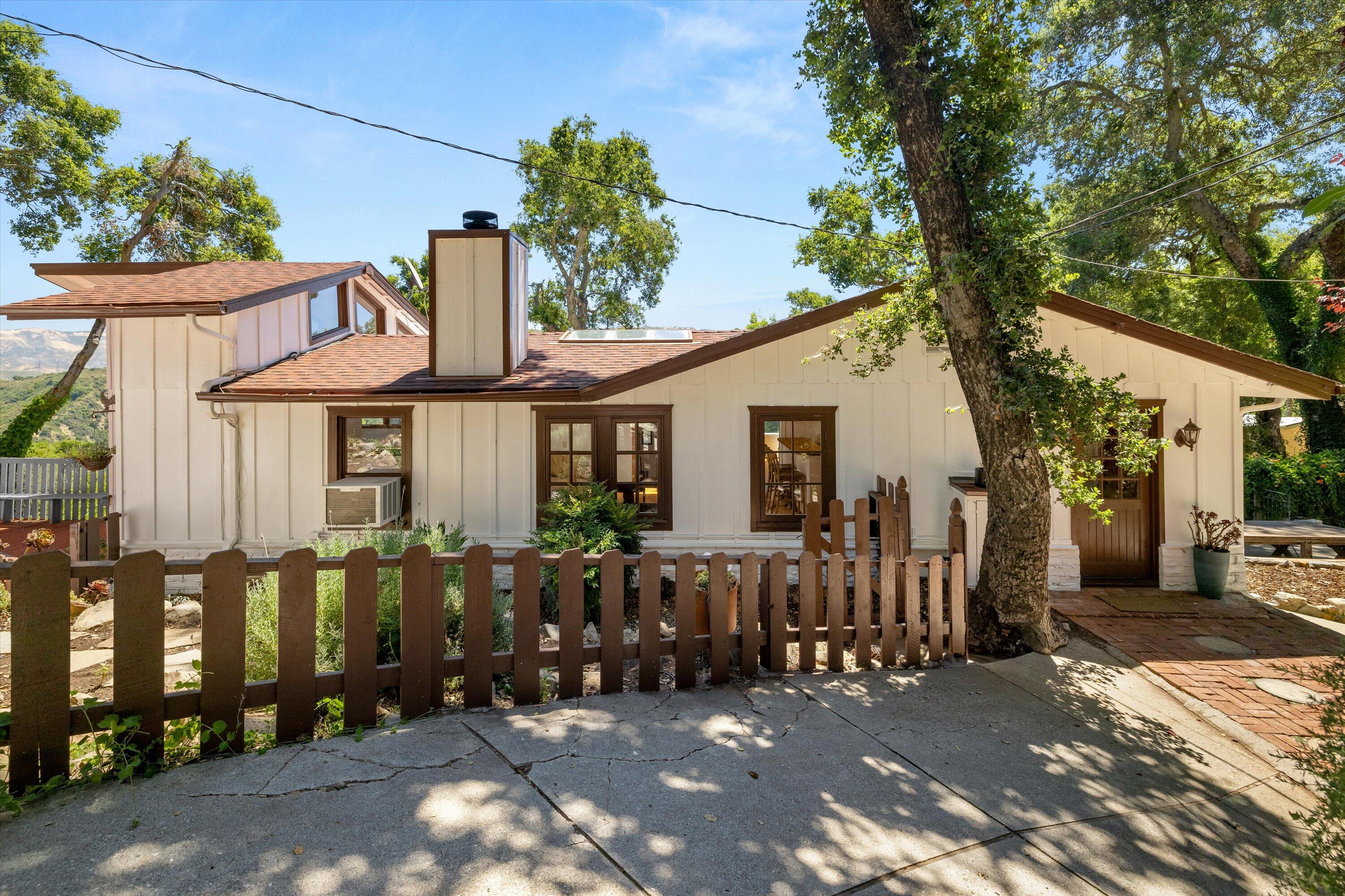 a front view of a house with a porch
