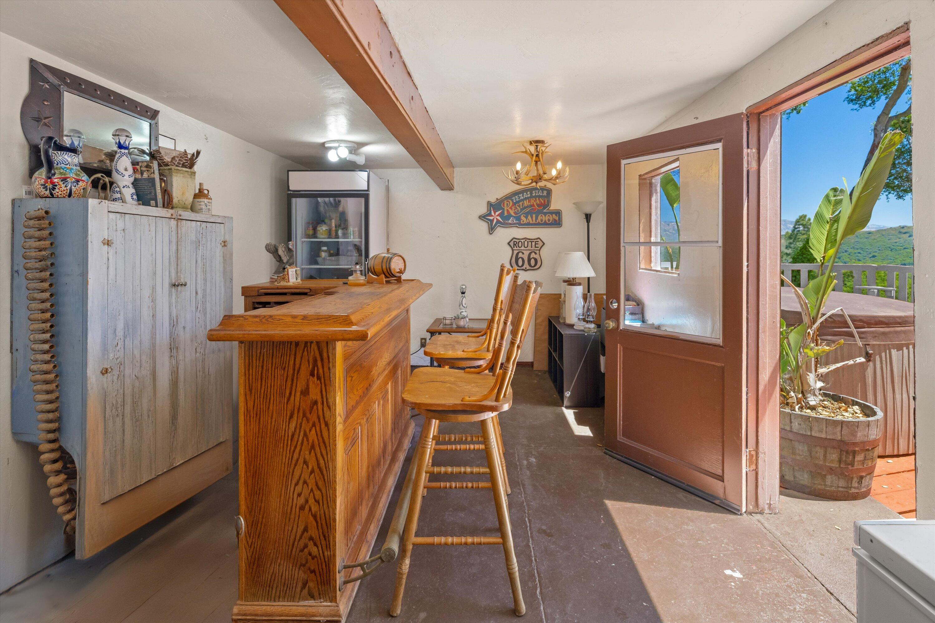279 Rosario Park Road Santa Barbara, CA 93105 - Photo 16 of 49 a dining room with furniture and window