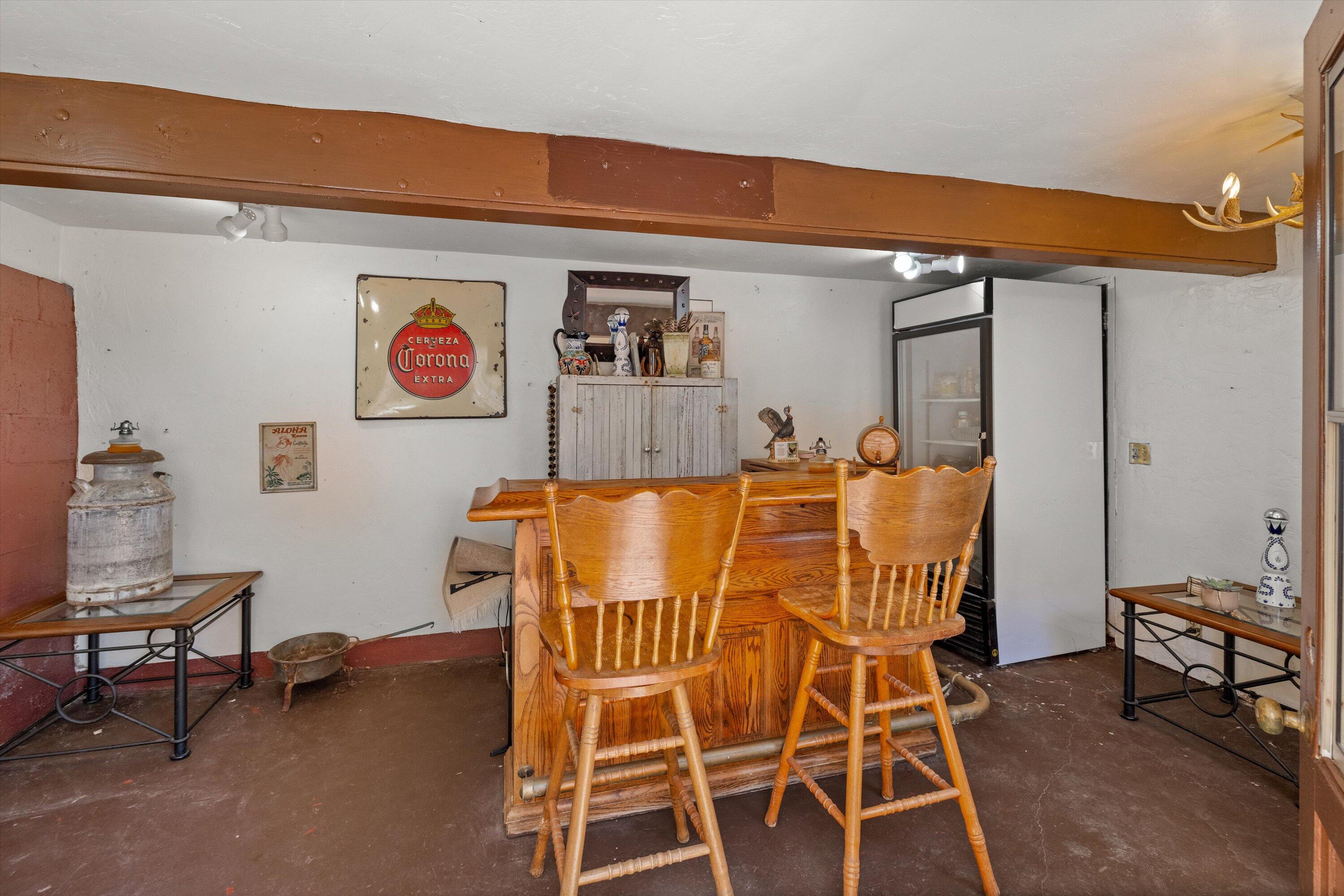 279 Rosario Park Road Santa Barbara, CA 93105 - Photo 17 of 49 a view of a dining room with furniture and a chandelier