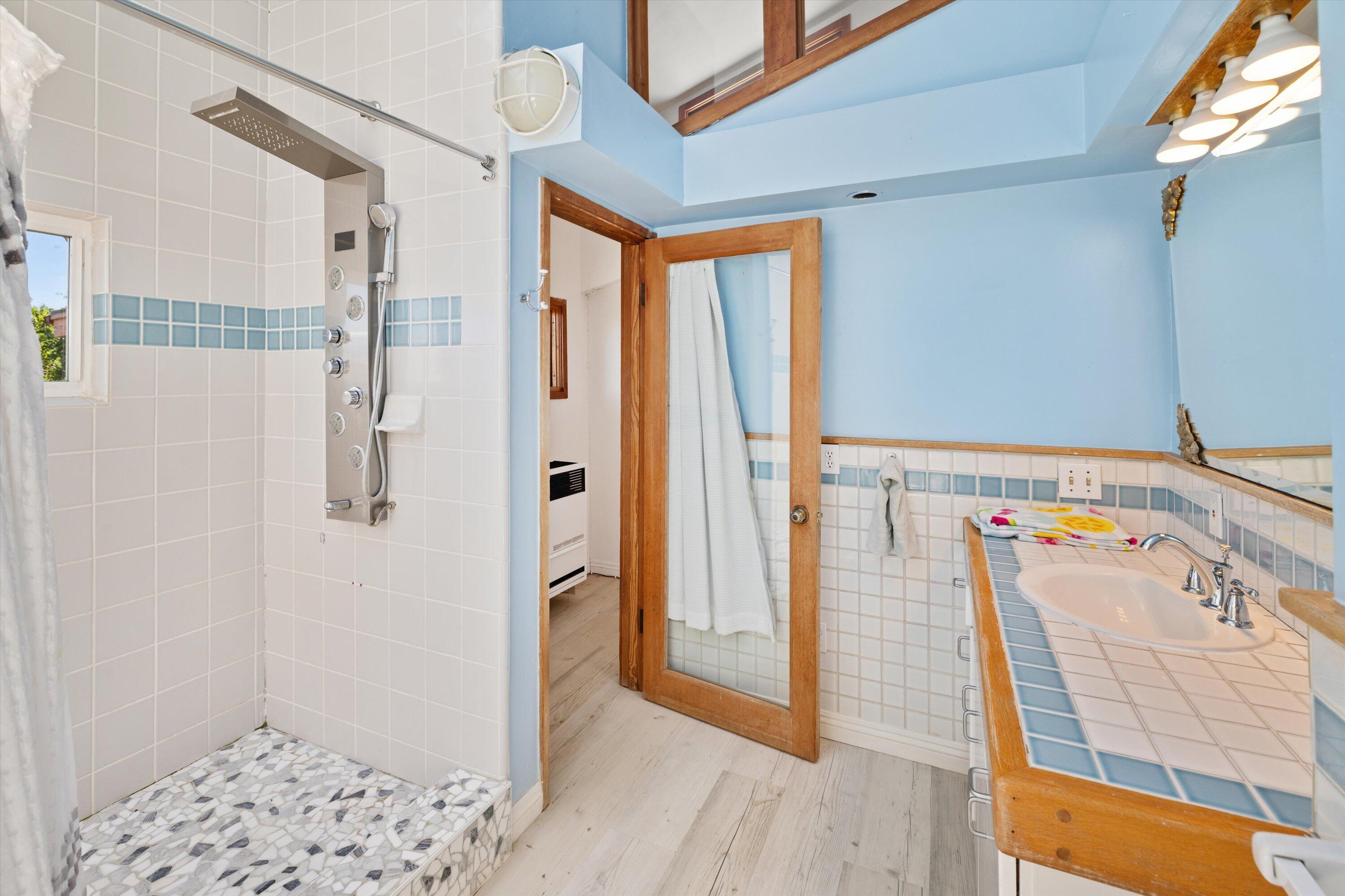 279 Rosario Park Road Santa Barbara, CA 93105 - Photo 21 of 49 a bathroom with a tub and shower