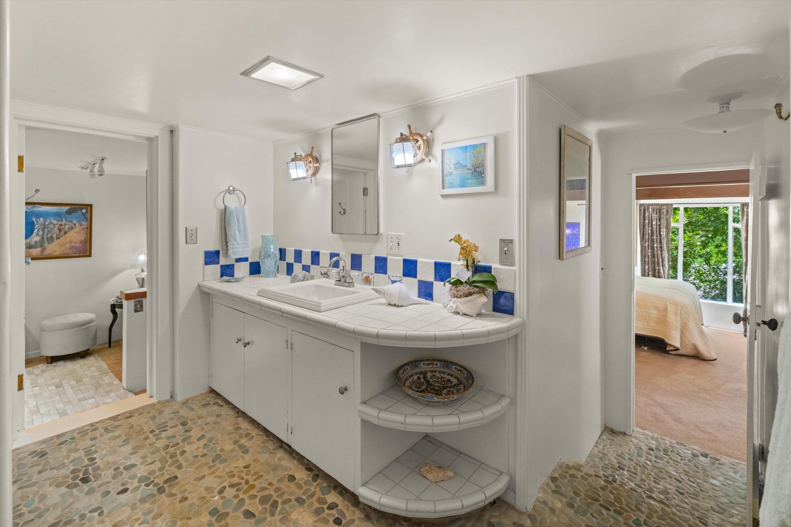 279 Rosario Park Road Santa Barbara, CA 93105 - Photo 29 of 49 a bathroom with a sink toilet and shower