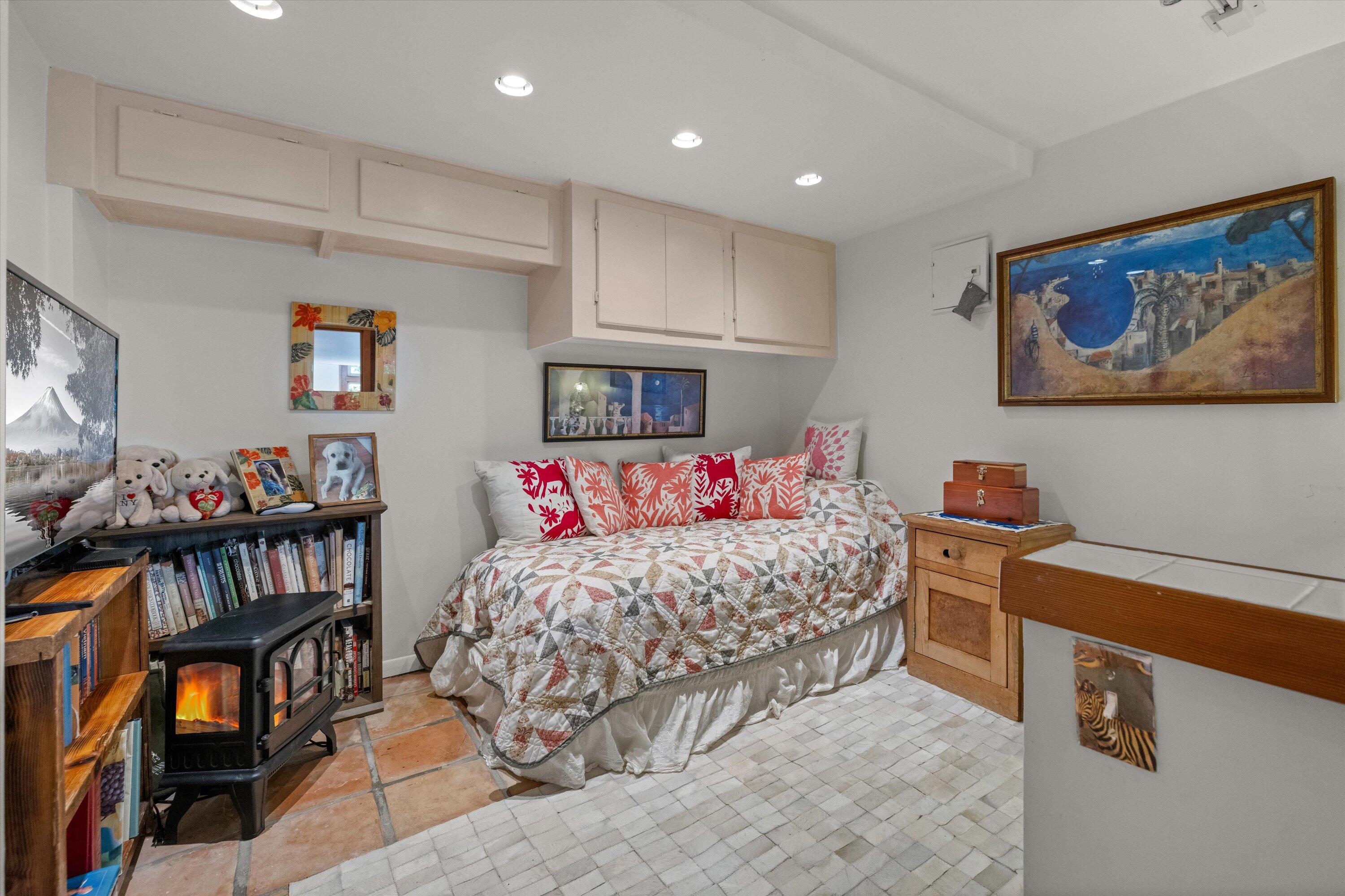 279 Rosario Park Road Santa Barbara, CA 93105 - Photo 31 of 49 a bedroom with a bed and a workspace