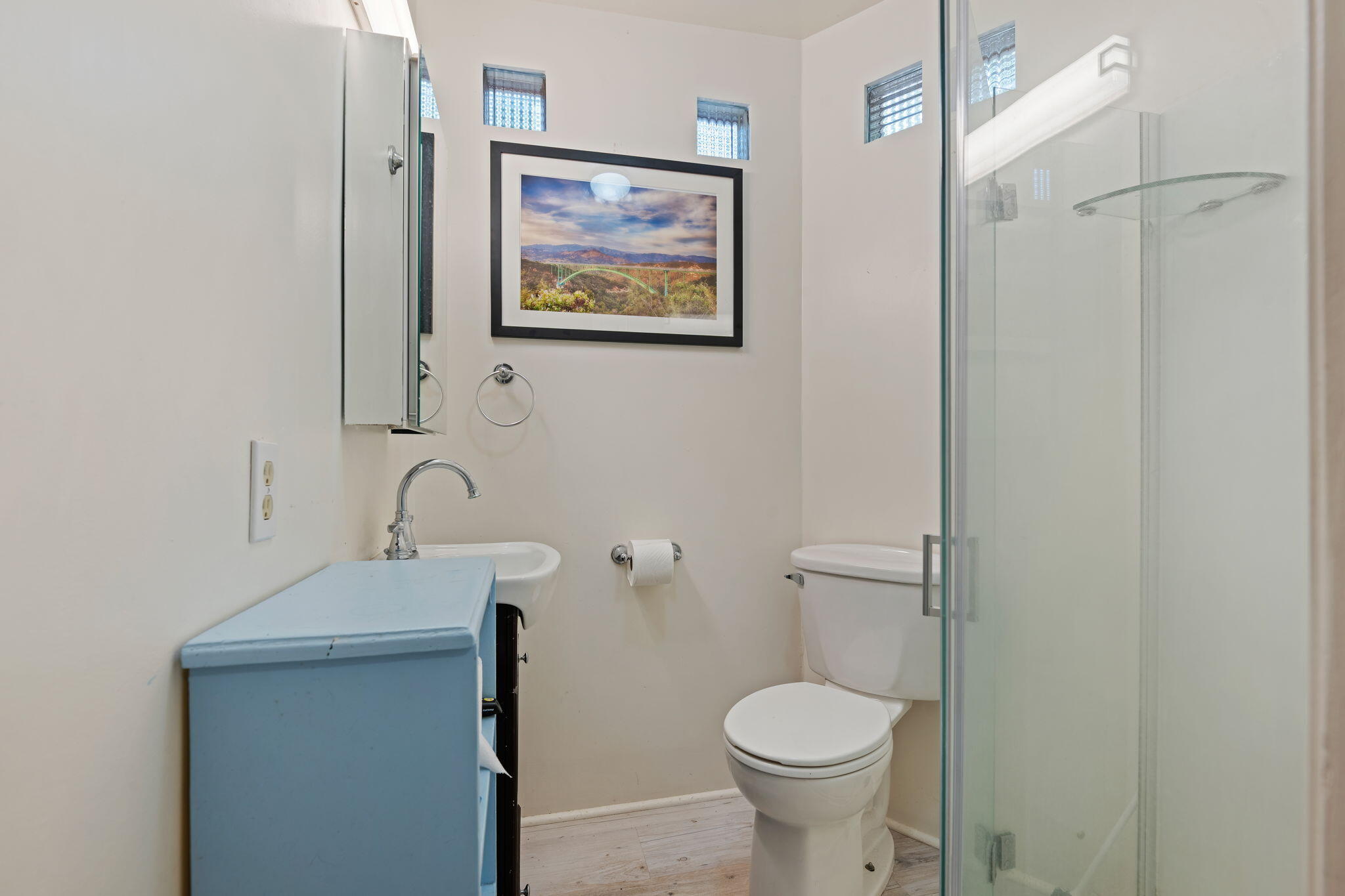 279 Rosario Park Road Santa Barbara, CA 93105 - Photo 38 of 49 a bathroom with a toilet sink and vanity