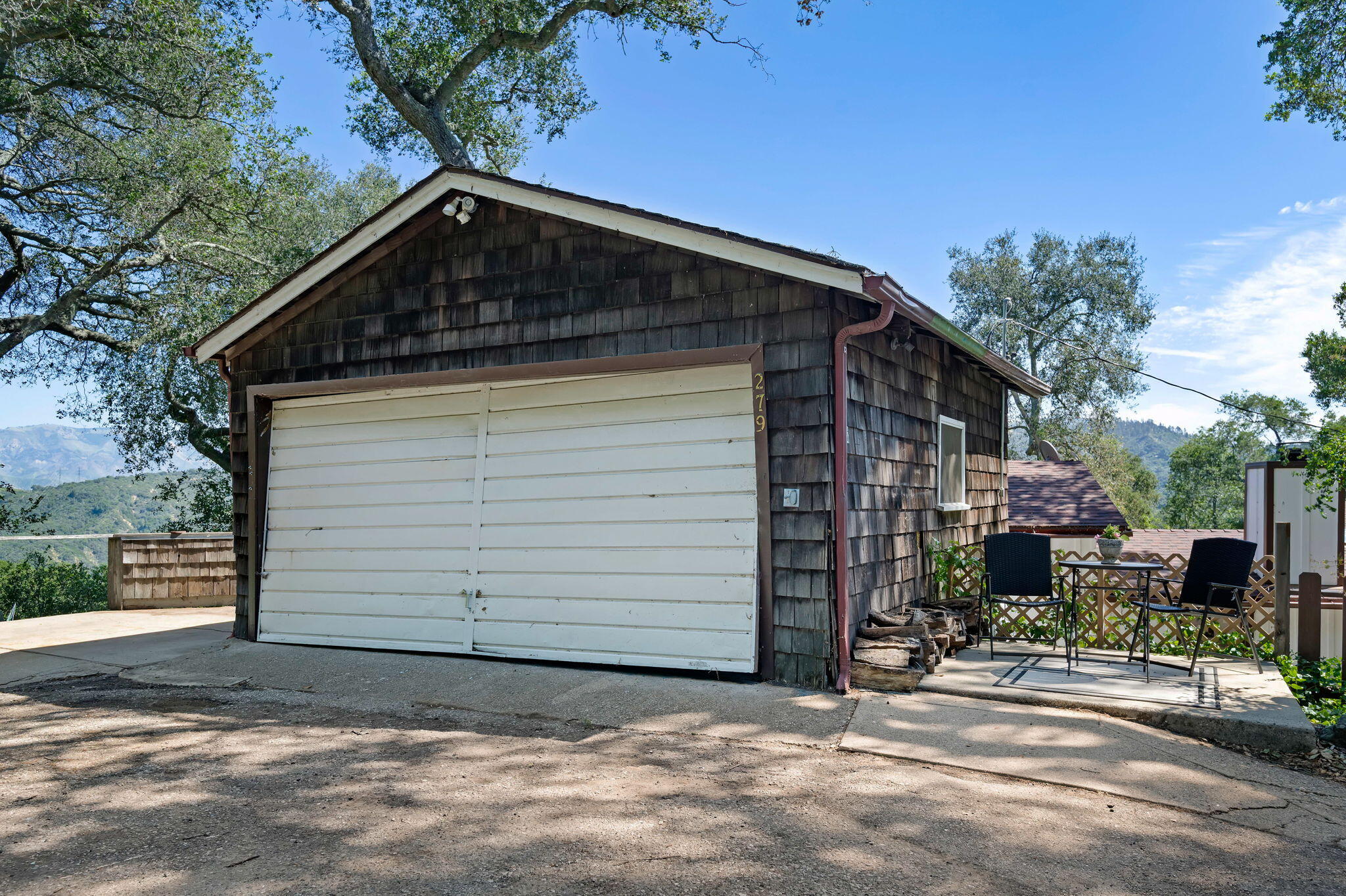 279 Rosario Park Road Santa Barbara, CA 93105 - Photo 44 of 49 a front view of a house with a yard
