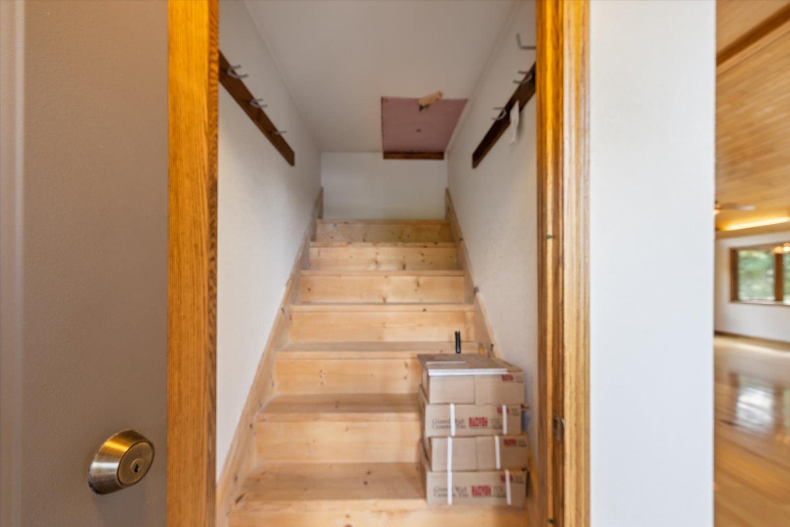 2375 Viste Point Road Ely, MN 55731 - Photo 24 of 83 Staircase featuring wood finished floors