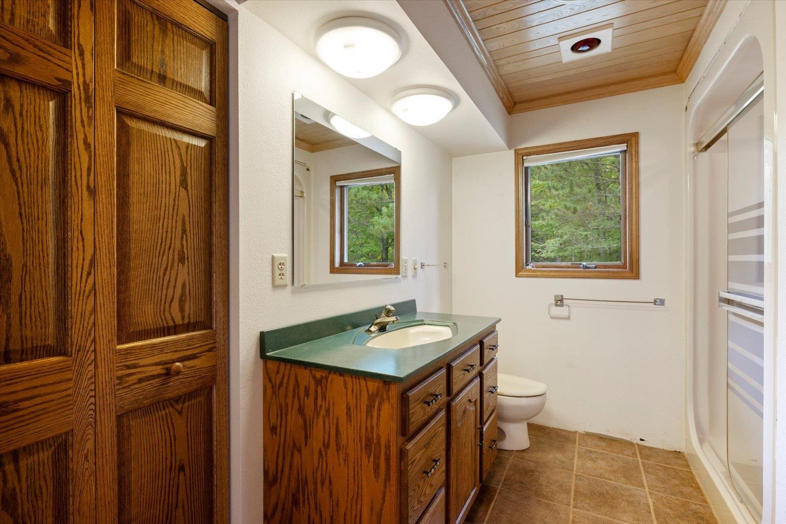 2375 Viste Point Road Ely, MN 55731 - Photo 29 of 83 Full bath featuring vanity with storage and wood ceiling