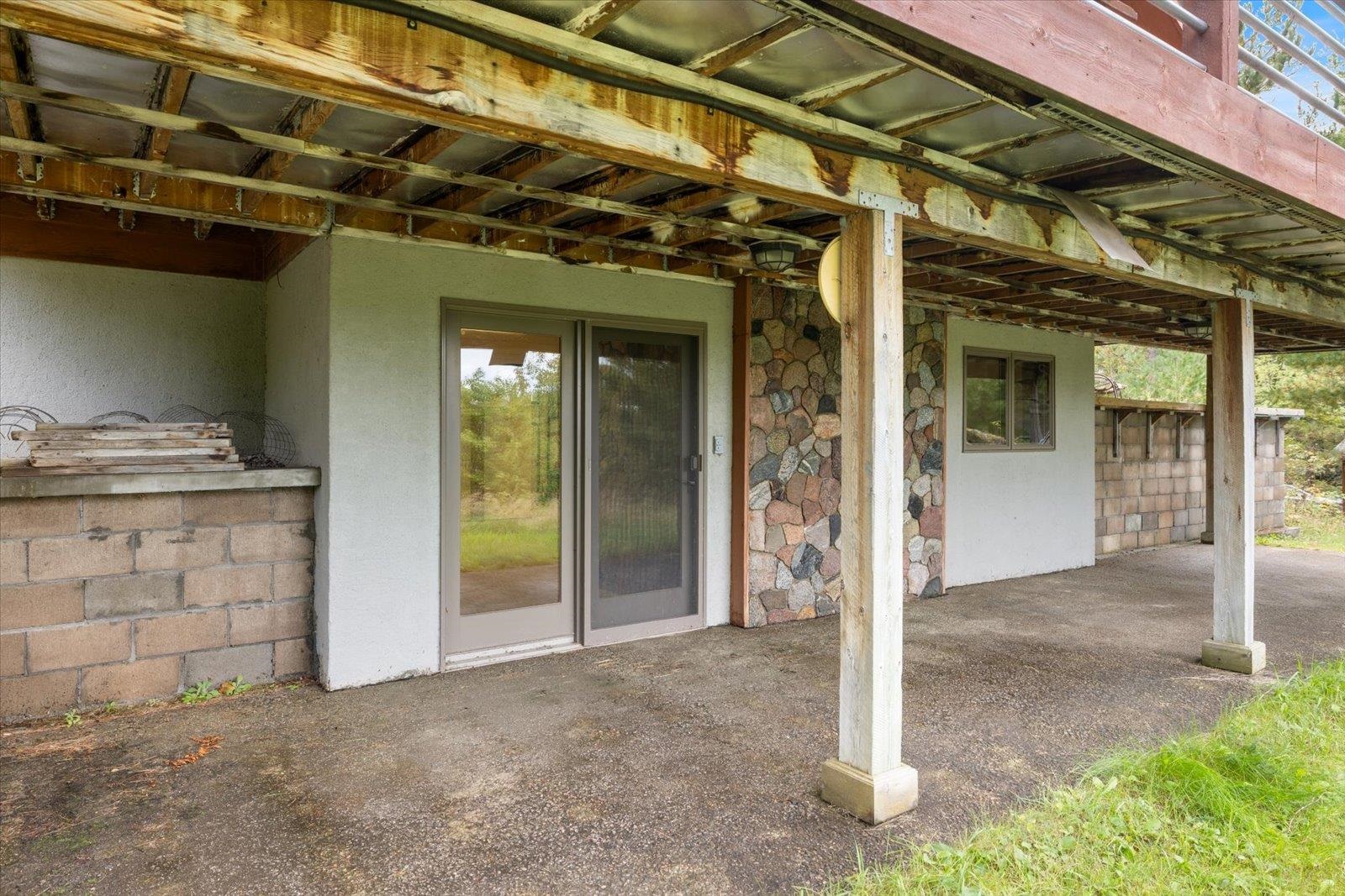 2375 Viste Point Road Ely, MN 55731 - Photo 37 of 83 View of patio / walk out basement