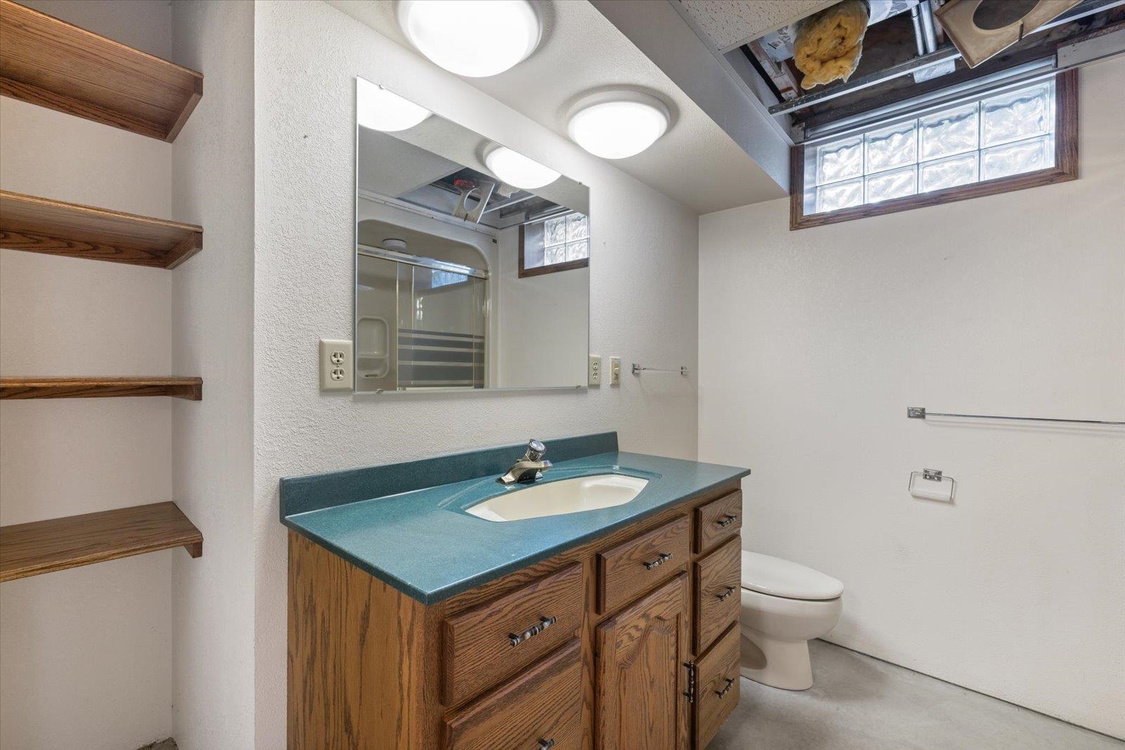 2375 Viste Point Road Ely, MN 55731 - Photo 44 of 83 3/4 bathroom with shower, sink, toilet and urinal